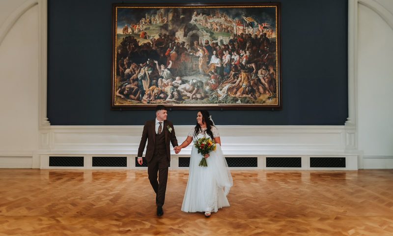 Couple in an elegant gallery hall